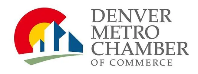 Logo of the Denver Metro Chamber of Commerce, featuring stylized blue buildings, a red semicircle, a yellow circle, and a green base, with the organizations name in gray text on the right.